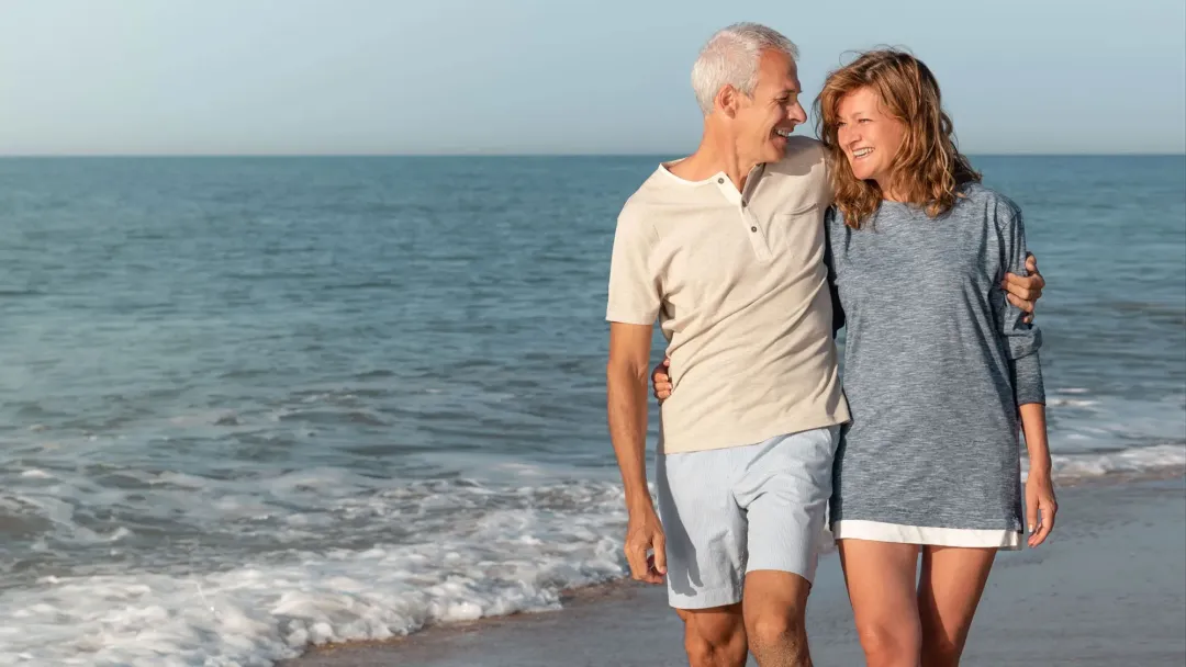 couple walking at the beach