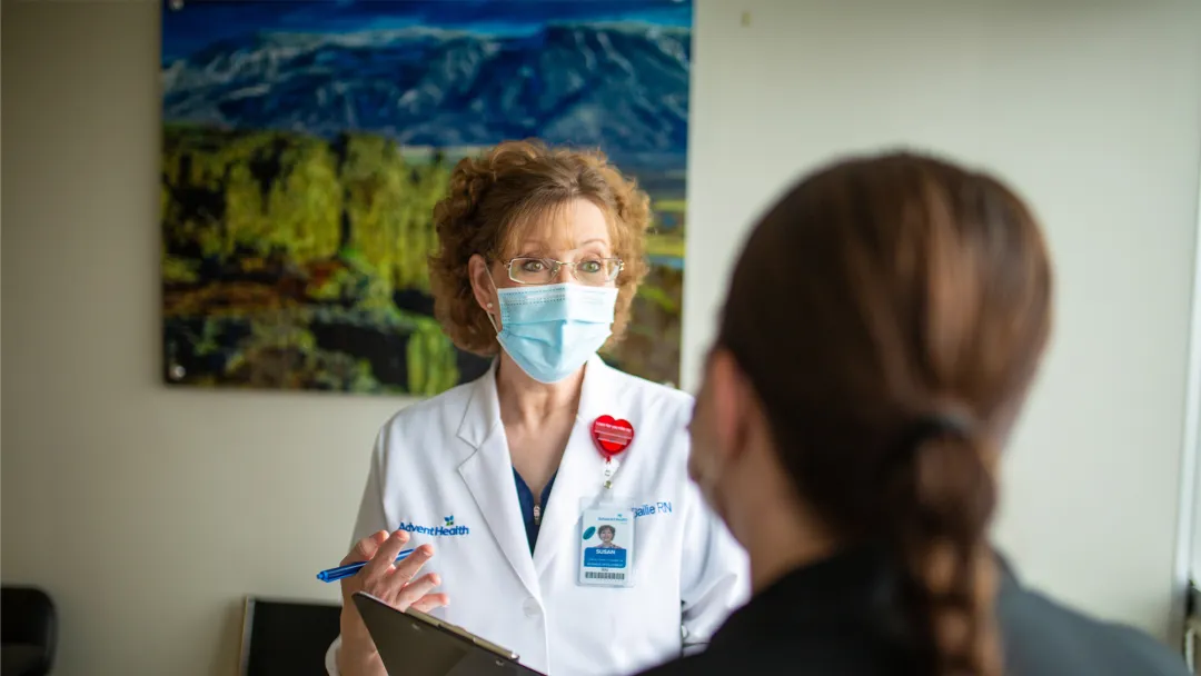Physician talking with a patient.
