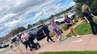 People take part in the March of Dimes walk