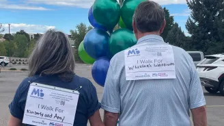 Community members participate in March of Dimes walk