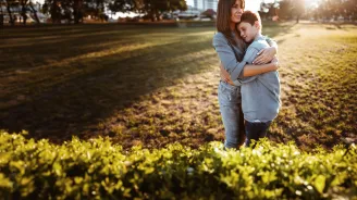 mother-hugging-her-son