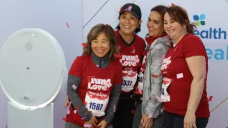 People at a Track Shack event in a photobooth.