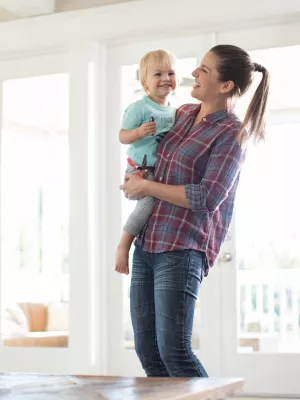 Mom and son playing in the living room.