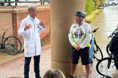 Mark Scotch talking with Dr. Alexander Wiseman.