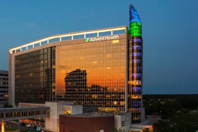 AdventHealth Orlando exterior in the evening.