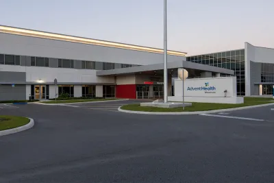 Exterior of AdventHealth Wauchula at dusk.