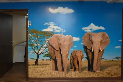 Two professionals working in the Nicholson Center prototype lab.