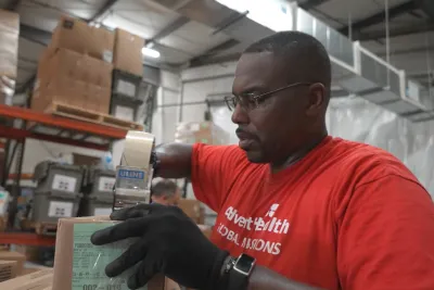 Volunteers working in Global Missions Warehouse