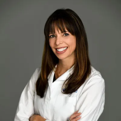 A Headshot of Author Erica Hechler