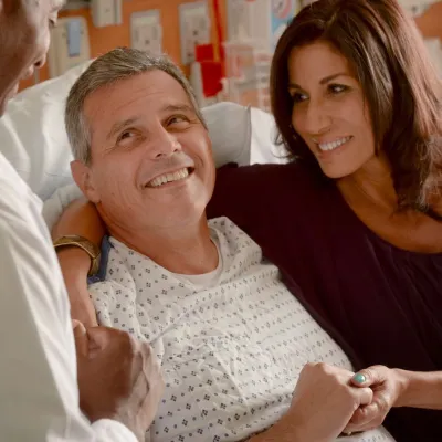 Patient with his wife in the hospital