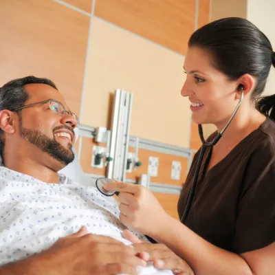 Nurse helps a patient