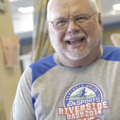 Portrait of Robert smiling.