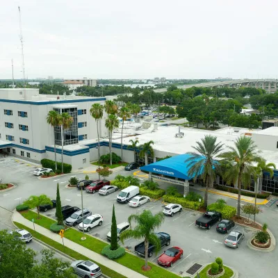 A bird's-eye view of the AdventHealth New Smyrna building and surrounding area.