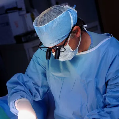 Doctor Lupes conducting a surgery