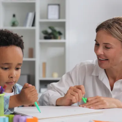 young-boy-coloring-adult-woman