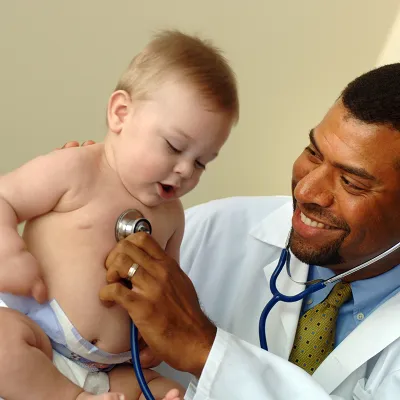 Doctor seeing Baby