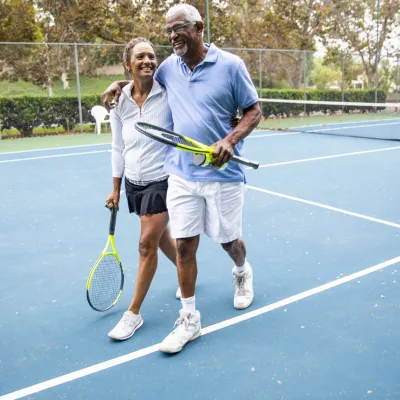 Active Older Adults Playing Tennis