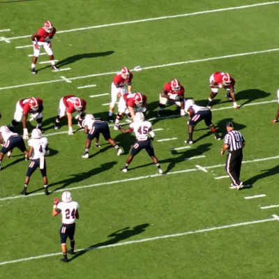 Alabama football players on the field.