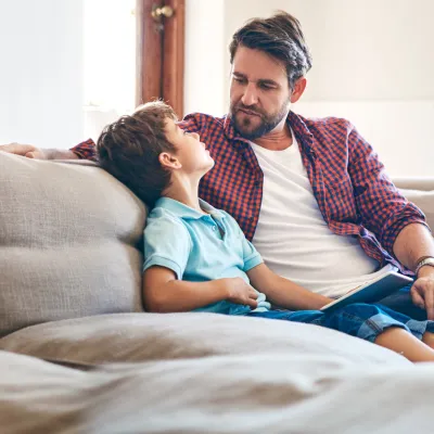 A father and son have a heart to heart conversation. 