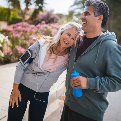A couple takes a break during a workout.