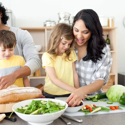 A family preparing a healthy meal.