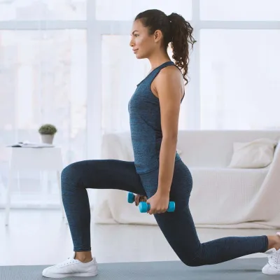 A woman exercising at home.