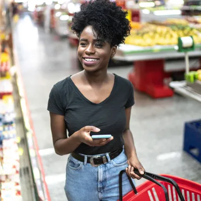 A young woman shops at the grocery store