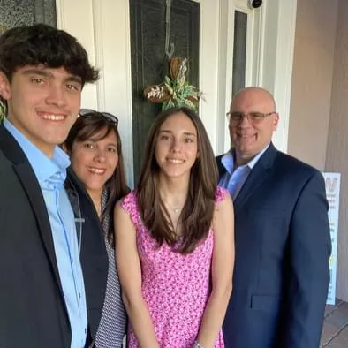 Jimmy Brown with his son, daughter, and wife.