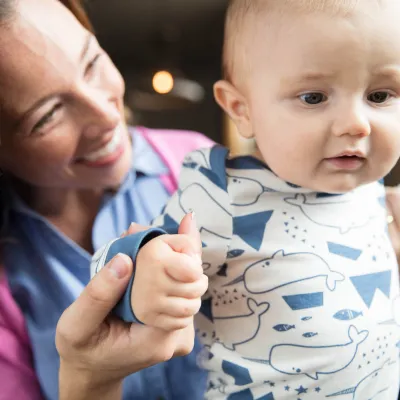 Mother holding her baby boy.