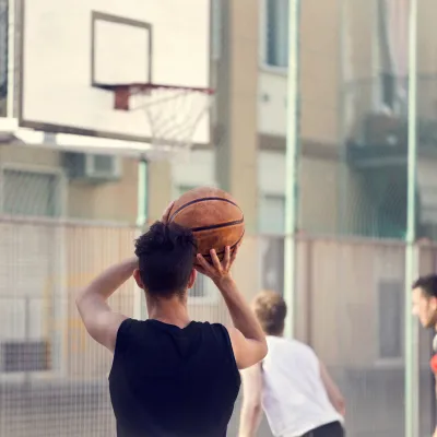 Person playing basketball