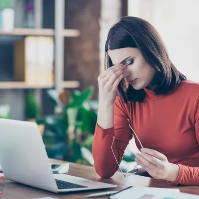 person experiencing a headache