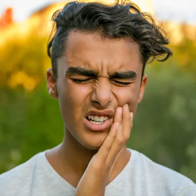 Young Man With Toothache Emergency