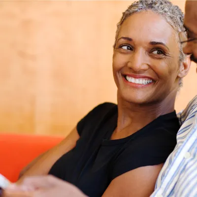 A wife smiling at her husband.