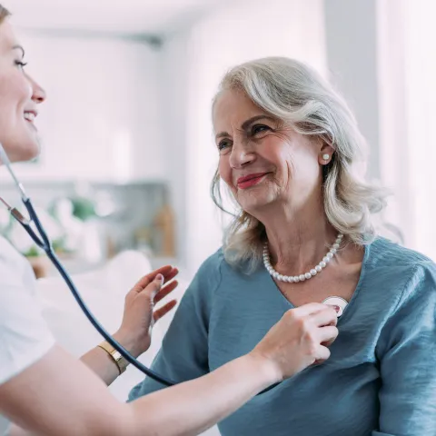 Older female patient with female physician.