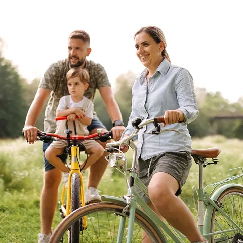 Family riding bikes