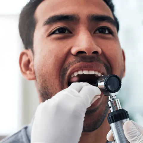 A Provider Check's a Patient's Throat