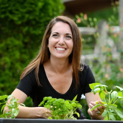 Woman Tending Plants