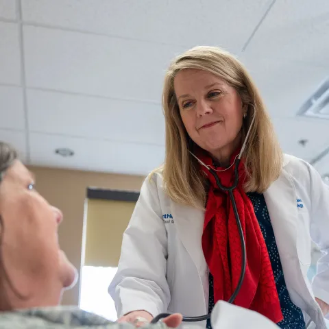 dr-dew-cardiology-womens-ahsm-with-patient