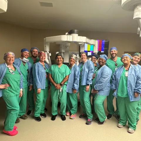 Dr. Edwin Menor (middle with black cap) said it took between four and five years for him to reach this feat.