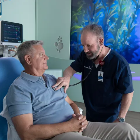 A Physician Listens to a Patient's Heart at AdventHealth Flamingo Crossing Town Center