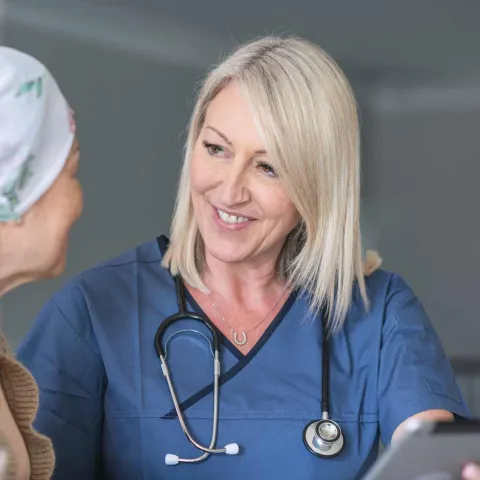 Physician with elderly patient