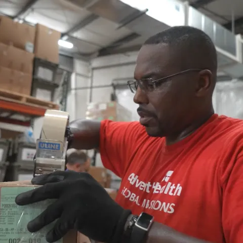 Volunteers working in Global Missions Warehouse