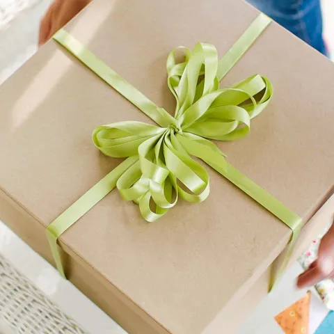 A gentleman delivering a gift.