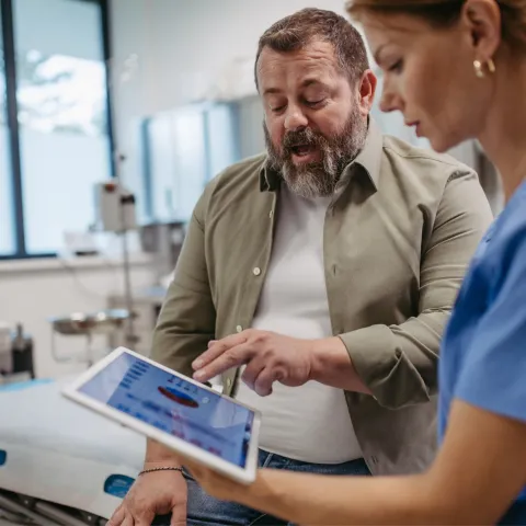 Patient and Physician looking at a screen