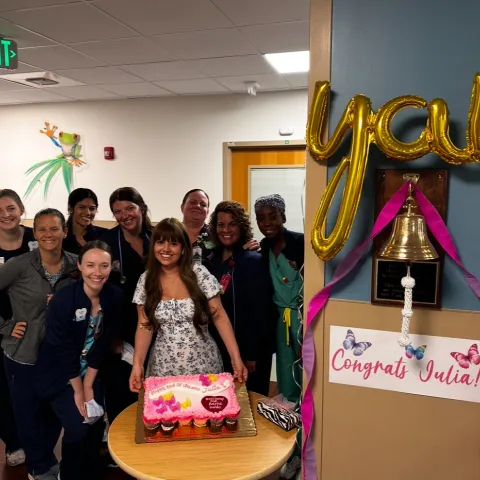 Julia and her oncology team on her last day of chemotherapy.