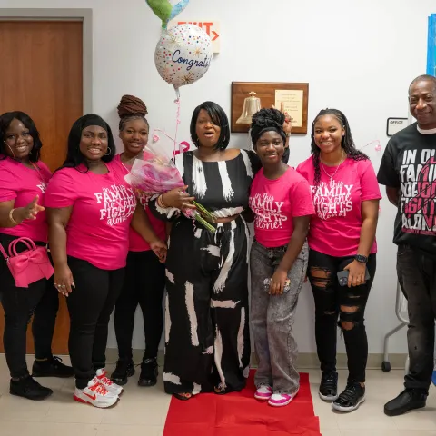 Keisha Harris rings the bell after completing chemotherapy.