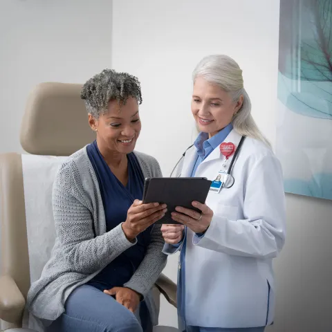 AdventHealth doctor showing results to a patient