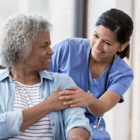 physician-and-patient-laughing