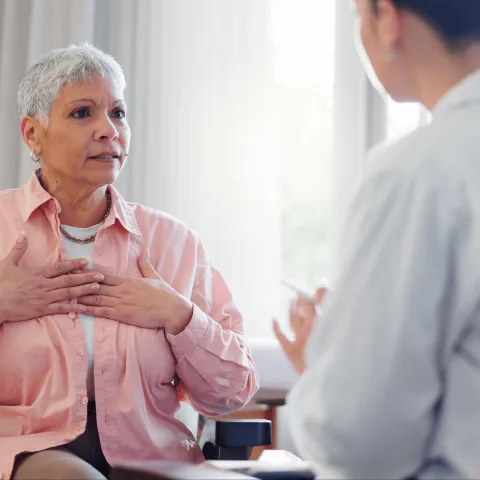 mammograms-woman-with-doctor-hero-2000x1333