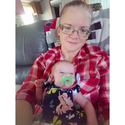 Jennifer holding her newborn baby